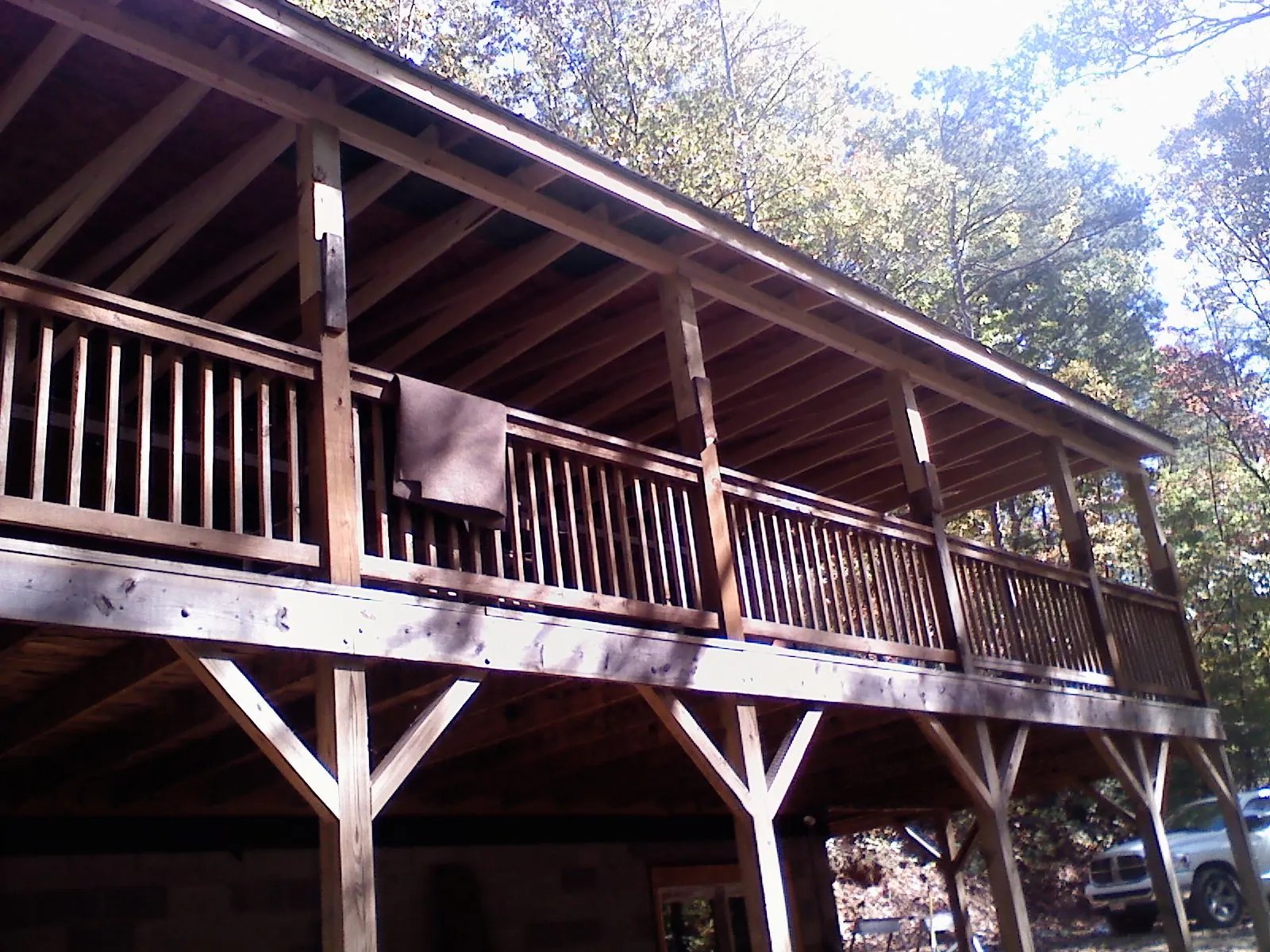 Timber framing under a new elevated porch and deck — Roof Leak Repair in Devon by Roofing Brothers